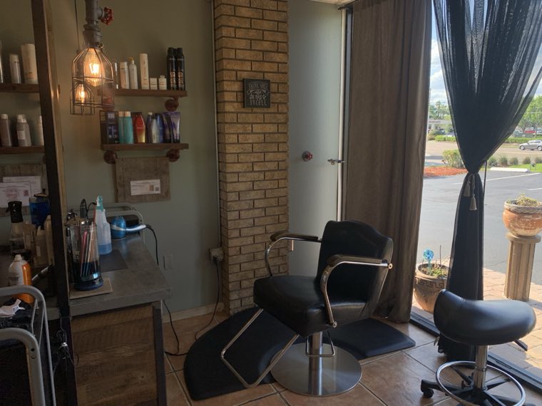 A styling station set up beside the window