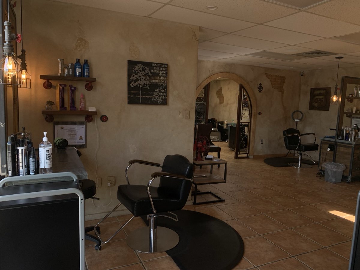 Inside Studio 55 — a styling chair and mirror